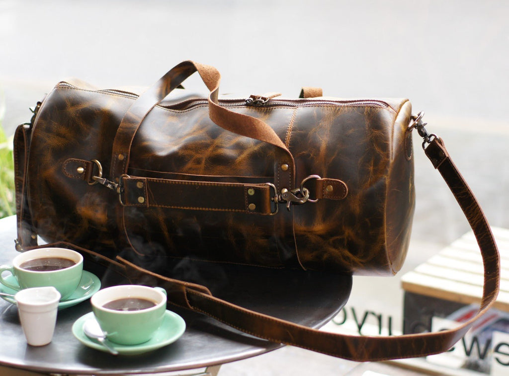 "The Broseley" Mens Leather Duffle Bag by ArchieSoul Man - ArchieSoul Men on coffee table.