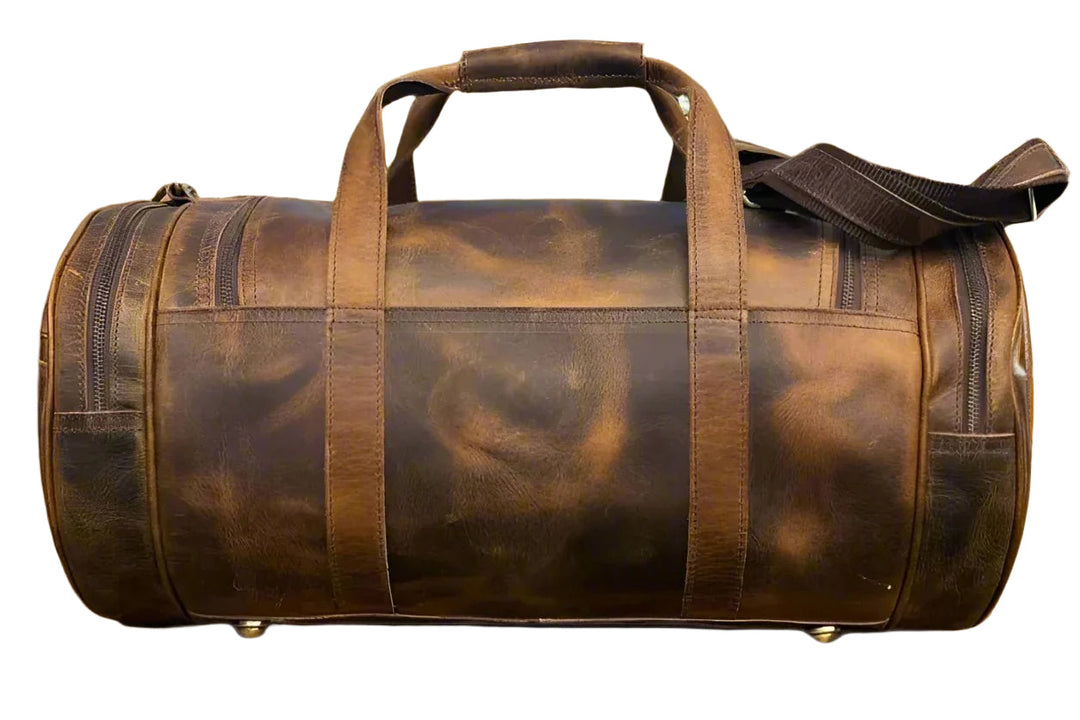 The Shrewsbury - Men Leather Duffle Bag/ Barrel Bag by ArchieSoul Man The Style
This expertly crafted full grain Men Leather Duffle Bag is what you need when you are looking something a little different in a Men Leather Duffle Bag yet Leather Duffle BagArchieSoul ManArchieSoul MenMen Leather Duffle Bag